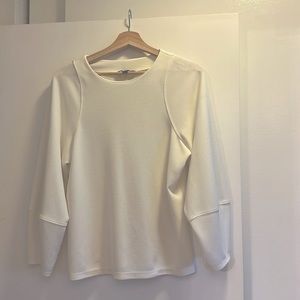 Banana Republic long sleeve cream shirt. Tiny dot stain shown in second pic